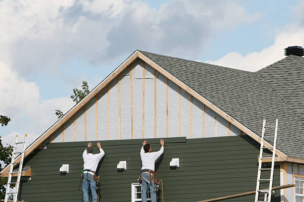 Professional Emergency Siding Repair technician working in Pierpont, OH